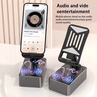 Soporte para Teléfono Celular con Altavoz Inalámbrico (BT5.3), Base Antideslizante, Sonido Envolvente HD, Compatible con Teléfonos Inteligentes iPhone, Batería Recargable