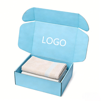 Boîte d'emballage en carton ondulé découpée sur mesure pour le transport de textiles et serviettes dans le commerce électronique