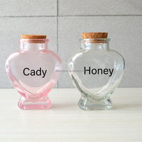 Vente en gros de pots en verre transparent en forme de cœur personnalisés avec impression à l'écran pour gelée et bonbons