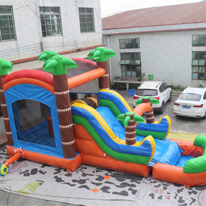 Château gonflable tropical bleu et orange avec toboggan, maison de saut gonflable pour enfants pour location de fête en plein air - Product Image 1