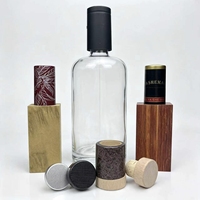 Bouteille en verre transparente vide pour vodka, vin, gin et spiritueux, avec base lourde, col long, épaule arrondie et capacité personnalisée OEM