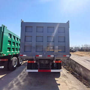 Sinotruk HOWO 8x4 Camión volquete de tamaño mediano Camión pesado diésel gris de alto rendimiento para trabajo al aire libre Euro 2 Emisión Izquierda - Product Image 4