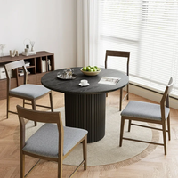 Meubles de maison Table à manger ronde moderne noire Table à manger avec plateau en céramique et base en MDF