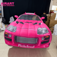 Voiture de sport gonflable géante rose personnalisée pour les événements promotionnels dans les centres commerciaux, ballon de voiture de sport gonflable pour la décoration de scène