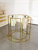 Tables d'affichage de présentoirs à vêtements en or haut de gamme Design d'affichage de magasin de tissus en acier inoxydable personnalisé Présentoir de vêtements pour femmes