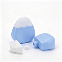 Flacon de crème solaire format voyage 50 ml 1,69 oz, flacon en plastique PE triangulaire plat à presser, emballage de crème solaire pour crème pour les mains LC872