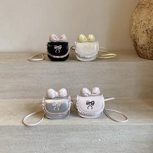 Bolso para niños de color sólido Otoño Invierno Nuevo estilo Bolso retro con lazo Mini bolso cruzado - Product Image 1