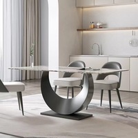 Table à manger rectangulaire de style italien minimaliste en acier au carbone Delifeng, plateau en pierre, mobilier de maison multifonctionnel de luxe