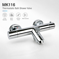 Mitigeur de douche et bain mural thermostatique en laiton à double poignée, finition chrome poli, avec robinet de dérivation d'eau, design contemporain pour salle de bain