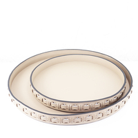 Ensemble de plateaux ronds en cuir à bords tissés, design moderne et luxueux, beige, accessoires décoratifs pour la maison, projets hôteliers, vente en gros