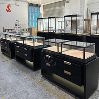 Vitrine de présentation de bijoux de luxe noir mat avec éclairage LED, comptoir de vente au détail pour boutique, tiroirs de rangement