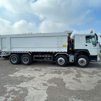 Prix d'usine SINOTRUK HOWO NX 8x4 Camion benne d'occasion 12 roues pour l'Afrique pour le transport de sable et de gravier