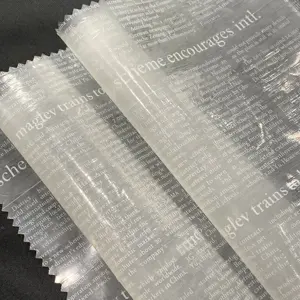 Nouvelle mode imperméable Transparent vieux design de journal artisanal TPU tissus enduits pour enfants imperméables