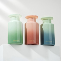 Bouteille diffuseur d'arômes en verre rond de 120 ml pour la décoration de la maison et de la salle de bain, avec bâtonnets en rotin et huiles essentielles – Vente en gros
