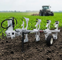 Charrue semi-remorquée réversible série Raptor avec dégagement de sécurité hydraulique et largeur de travail variable pour tracteur de grande taille