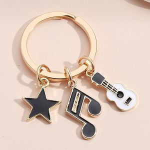 Nouveau produit phare : Pendentif de sac porte-clés en forme de disque musical, phonographe, clavier, écouteurs, microphone, piano, violon, batterie - Product Image 2