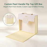 Caja de regalo de papel rígido magnética con asa de perlas personalizada para cosméticos, joyería, ropa interior, juguetes, recuerdos de boda.