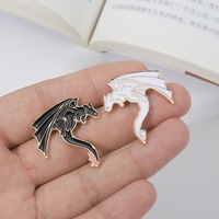 Broches Dragon Noir et Blanc - Badge en Alliage Métallique Cartoon et Mignon - Accessoire Unisexe Polyvalent et Sophistiqué