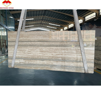 Carreaux muraux italiens naturels en travertin gris argenté, coupés à la taille Prix du marbre travertin gris italien poli pour feuille de mur