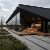 Maison d'hôtes mobile en structure acier avec terrasse à double niveau et vitrage panoramique