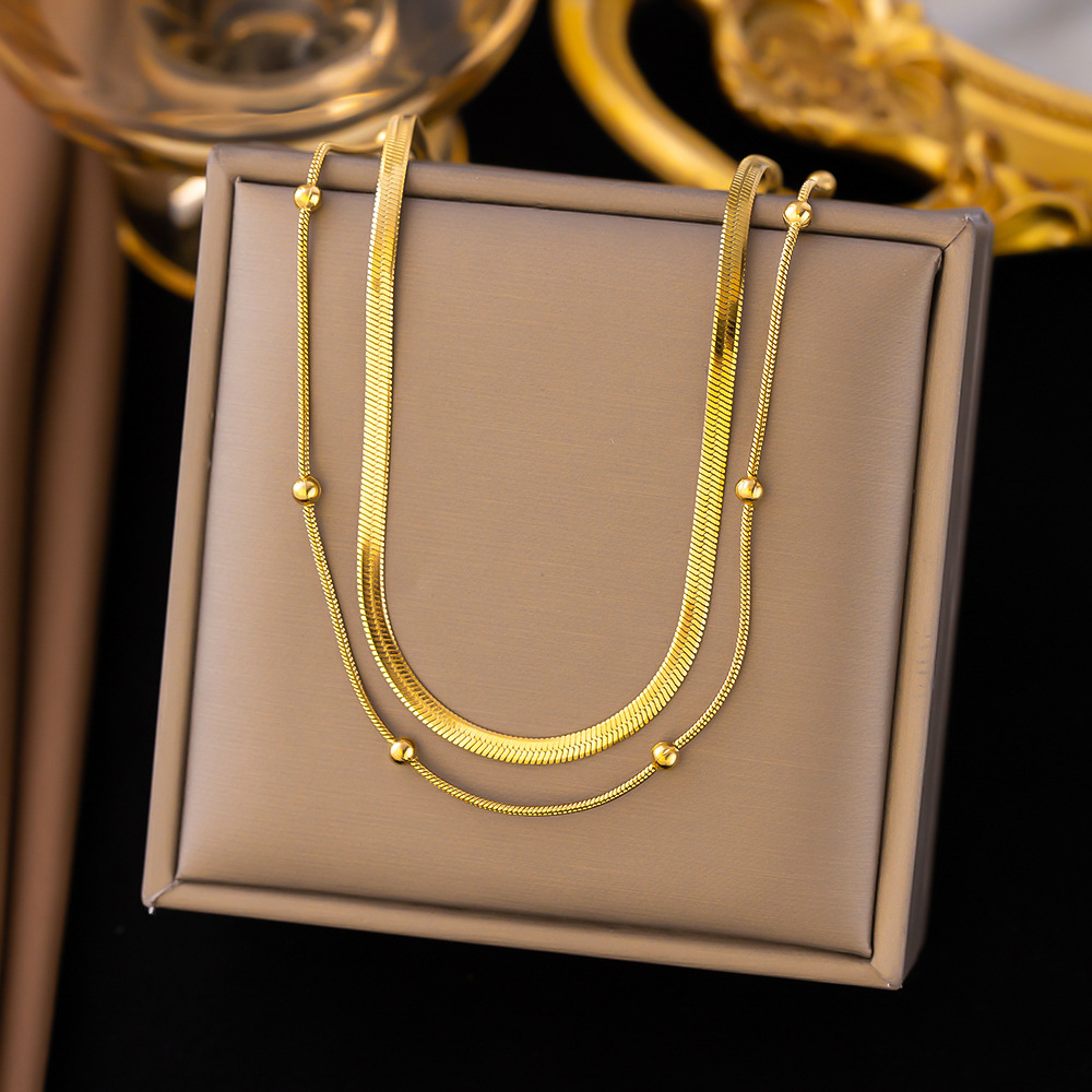 3 AH211 Blade bead necklace gold