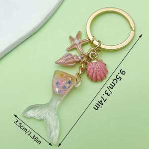 Llaveros personalizados <span class=keywords><strong>de</strong></span> la serie Ocean con conchas, estrellas <span class=keywords><strong>de</strong></span> mar y pez payaso: Un regalo para el chico <span class=keywords><strong>de</strong></span> la <span class=keywords><strong>novia</strong></span> - Product Image 3