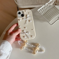 Coque de téléphone portable tendance avec nœud perlé et chaîne pour iPhone 16 15 17 Pro Max, couleur bonbon, en TPU, protection arrière