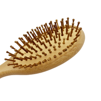 Brosse à cheveux en bois à poils de bambou pour démêler les cheveux bouclés, masser le cuir chevelu et démêler les boucles