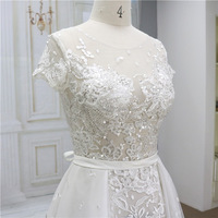 Illusion Luxury Lace Beading Wedding Dress A-Line Robe de mariée à manches courtes avec train court Taille naturelle Longueur au sol avec ceinture