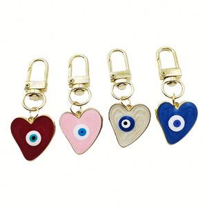 Water Drop Heart Evil Eye Zinc Alloy Luxury Compass Keychain Friendship Couple Enamel Blue Eye Waterproof Bag Car Phone Charm - Product Image 1