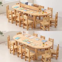 Table d'école ovale en bois massif multi-personnes pour l'apprentissage et l'éducation de la petite enfance