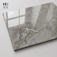 En stock – Carreaux de porcelaine pleine masse 600x600mm, effet marbre gris brillant, pour projets hôteliers et villas, sols et murs intérieurs