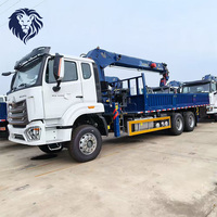 Grue montée sur camion Sinotruk HOWO NX 440 6x4 à flèche droite, très demandée, pour le levage et le transport dans la construction