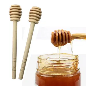 Eco vriendelijke natuurlijke hout custom logo jampot dispenser doseren houten honing dipper stick keuken gereedschap