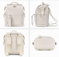 Sac à dos pour couches, sacs à couches en cuir imperméables avec station de change pour bébé, sac à dos de voyage tendance pour maman et papa