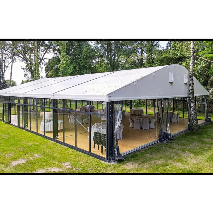 Tente de chapiteau en verre à cadre noir de conception européenne claire, salle de banquet extérieure pour les activités de festival