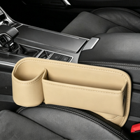 Organisateur universel durable pour l'intérieur du véhicule, avec porte-gobelet et port de charge, en cuir de qualité supérieure, pour combler l'espace entre les sièges.