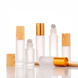 Vendita calda 5ml <span class=keywords><strong>10</strong></span> <span class=keywords><strong>ml</strong></span> rotolo di bottiglia di profumo smerigliato su bottiglia di vetro con tappo in legno coperchio a sfera in metallo per olio - Product Image 1