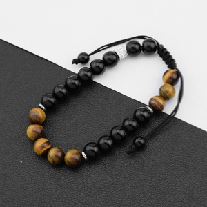 Nueva pulsera tejida con piedra de ojo de tigre para hombre, combinación de bolas de diamantes, pulsera de pareja ajustable avanzada y de nicho. - Product Image 1