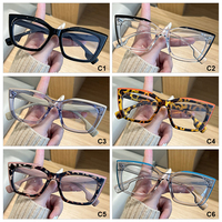 Montures optiques tendance avec couleurs contrastées, lunettes anti-lumière bleue, charnières métalliques, montures de lunettes œil-de-chat pour femmes, vente en gros