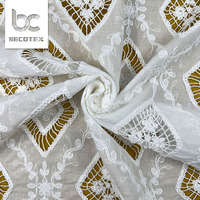 Tissus de vêtements de luxe blancs découpés au laser 2026, tissu en coton à œillets, broderie tendance