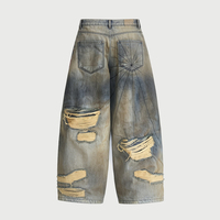 Pantalones anchos de mezclilla de cintura media con efecto lavado a la arena, rotos, con estampado de grafiti y cadena, estilo urbano ecológico de moda.