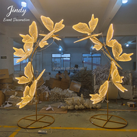 Allée de mariage LED de luxe en forme de papillon, fabriquée en usine par JINDY, pour événements intérieurs et fêtes