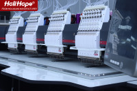 Machine à broder industrielle informatisée chinoise de pointe à 4 têtes, aussi bonne que les machines à broder Tajima Swf pour casquettes, t-shirts, logos plats et 3D