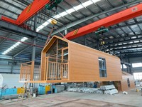 Maisonnette préfabriquée modulaire personnalisée, structure biomimétique en panneaux sandwich d'acier imperméables, villa moderne, cabane de glamping portable