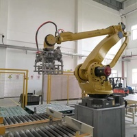 Machine automatique d'emballage de sacs à valve système de palettiseur de robot gerbeur de bras de robot