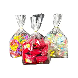 Sacos de celofane BOPP transparente para sacolas de presente, saco plano com laços torcidos transparente para pão, doces e chocolate 24x43