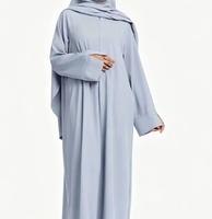 Abaya musulmane ample bleu clair avec khimar, fermeture éclair confortable, idéale pour un usage quotidien