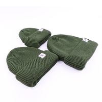 Qianzun vert manchette pêcheur côtes tricoté Mini bonnet conception personnalisée acrylique côtelé bonnets personnalisés avec étiquette tissée