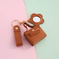 Porte-clés mignon en cuir PU avec logo personnalisé, miroir floral, breloque de sac tendance pour femme, petit rangement pour écouteurs